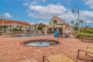 This beautiful, fully renovated and furnished condo offers a on Isla Del Sol Yacht and Country Club in Florida - for sale on GolfHomes.com, golf home, golf lot