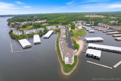 If you are looking for an awesome view of the lake, then this on Seasons Ridge At Four Seasons in Missouri - for sale on GolfHomes.com, golf home, golf lot