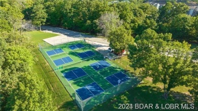 If you are looking for an awesome view of the lake, then this on Seasons Ridge At Four Seasons in Missouri - for sale on GolfHomes.com, golf home, golf lot