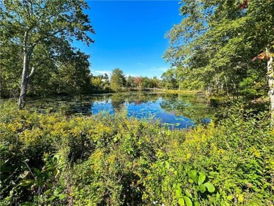 Upscale vacant lot in a community that offers a pool, playground on Country Club of the Poconos Golf Course in Pennsylvania - for sale on GolfHomes.com, golf home, golf lot