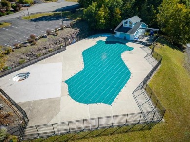 Upscale vacant lot in a community that offers a pool, playground on Country Club of the Poconos Golf Course in Pennsylvania - for sale on GolfHomes.com, golf home, golf lot