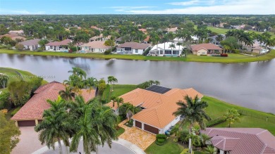 Experience unparalleled luxury in this Weston Hills sanctuary on Weston Hills Country Club in Florida - for sale on GolfHomes.com, golf home, golf lot
