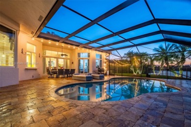 Experience unparalleled luxury in this Weston Hills sanctuary on Weston Hills Country Club in Florida - for sale on GolfHomes.com, golf home, golf lot