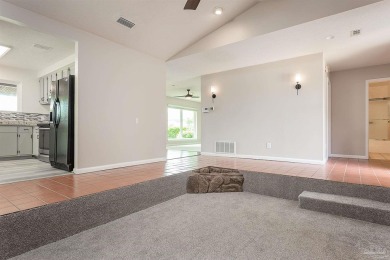 Tucked away in one of Gulf Breeze's most desirable waterfront on Tiger Point Golf and Country Club in Florida - for sale on GolfHomes.com, golf home, golf lot