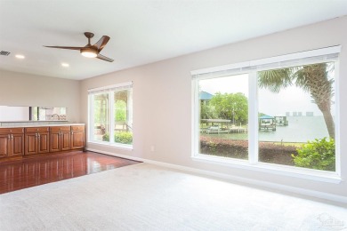 Tucked away in one of Gulf Breeze's most desirable waterfront on Tiger Point Golf and Country Club in Florida - for sale on GolfHomes.com, golf home, golf lot