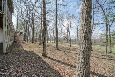 Overlooking the 1st hole of Druid Hills Golf Course, this on Druid Hills Golf Club in Tennessee - for sale on GolfHomes.com, golf home, golf lot