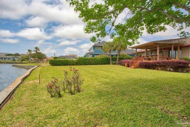 Tucked away in one of Gulf Breeze's most desirable waterfront on Tiger Point Golf and Country Club in Florida - for sale on GolfHomes.com, golf home, golf lot