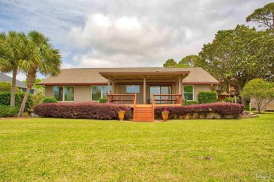 Tucked away in one of Gulf Breeze's most desirable waterfront on Tiger Point Golf and Country Club in Florida - for sale on GolfHomes.com, golf home, golf lot