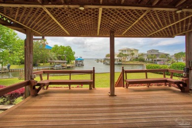 Tucked away in one of Gulf Breeze's most desirable waterfront on Tiger Point Golf and Country Club in Florida - for sale on GolfHomes.com, golf home, golf lot