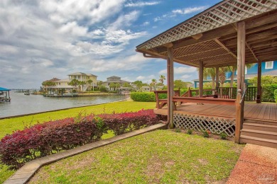 Tucked away in one of Gulf Breeze's most desirable waterfront on Tiger Point Golf and Country Club in Florida - for sale on GolfHomes.com, golf home, golf lot