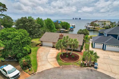 Tucked away in one of Gulf Breeze's most desirable waterfront on Tiger Point Golf and Country Club in Florida - for sale on GolfHomes.com, golf home, golf lot