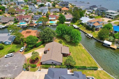 Tucked away in one of Gulf Breeze's most desirable waterfront on Tiger Point Golf and Country Club in Florida - for sale on GolfHomes.com, golf home, golf lot
