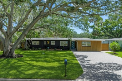 5-bedroom, 3-bathroom Mid-Century home in desirable Dunedin on The Dunedin Country Club in Florida - for sale on GolfHomes.com, golf home, golf lot