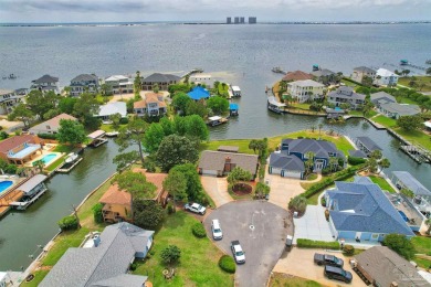 Tucked away in one of Gulf Breeze's most desirable waterfront on Tiger Point Golf and Country Club in Florida - for sale on GolfHomes.com, golf home, golf lot