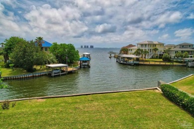 Tucked away in one of Gulf Breeze's most desirable waterfront on Tiger Point Golf and Country Club in Florida - for sale on GolfHomes.com, golf home, golf lot