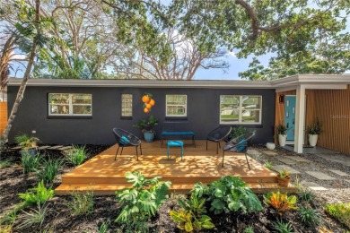 5-bedroom, 3-bathroom Mid-Century home in desirable Dunedin on The Dunedin Country Club in Florida - for sale on GolfHomes.com, golf home, golf lot