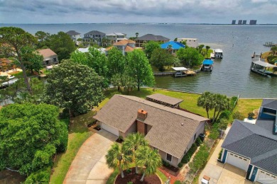 Tucked away in one of Gulf Breeze's most desirable waterfront on Tiger Point Golf and Country Club in Florida - for sale on GolfHomes.com, golf home, golf lot