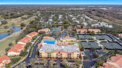 This impeccable two bedroom, two bathroom apartment offers a on Carrollwood Country Club in Florida - for sale on GolfHomes.com, golf home, golf lot