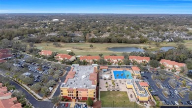 This impeccable two bedroom, two bathroom apartment offers a on Carrollwood Country Club in Florida - for sale on GolfHomes.com, golf home, golf lot