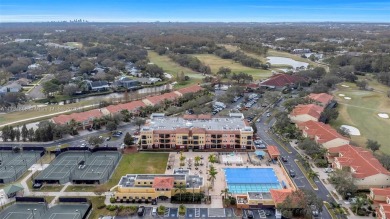 This impeccable two bedroom, two bathroom apartment offers a on Carrollwood Country Club in Florida - for sale on GolfHomes.com, golf home, golf lot