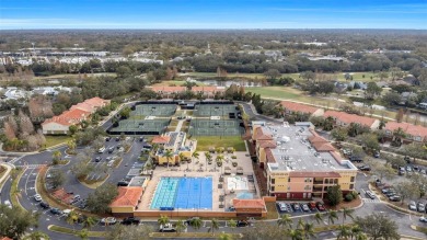 This impeccable two bedroom, two bathroom apartment offers a on Carrollwood Country Club in Florida - for sale on GolfHomes.com, golf home, golf lot