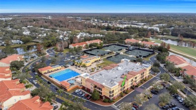 This impeccable two bedroom, two bathroom apartment offers a on Carrollwood Country Club in Florida - for sale on GolfHomes.com, golf home, golf lot