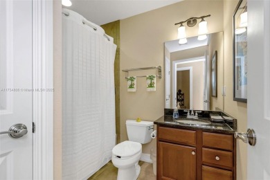 This impeccable two bedroom, two bathroom apartment offers a on Carrollwood Country Club in Florida - for sale on GolfHomes.com, golf home, golf lot