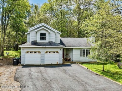 This stunning 3 bedroom 2 ful bath contemporary home W/ LOW on Pocono Farms Country Club in Pennsylvania - for sale on GolfHomes.com, golf home, golf lot
