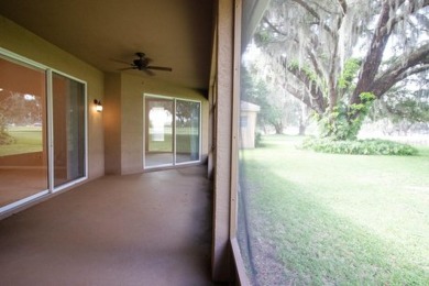 A beautiful courtyard drive welcomes you to this exquisite on North Shore Golf Club in Florida - for sale on GolfHomes.com, golf home, golf lot