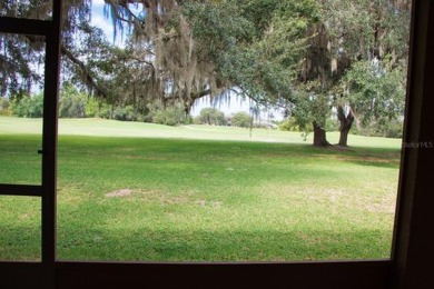 A beautiful courtyard drive welcomes you to this exquisite on North Shore Golf Club in Florida - for sale on GolfHomes.com, golf home, golf lot