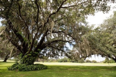 A beautiful courtyard drive welcomes you to this exquisite on North Shore Golf Club in Florida - for sale on GolfHomes.com, golf home, golf lot