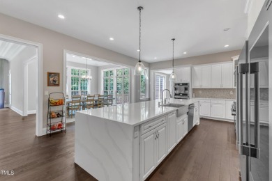 Welcome to this stunning Hasentree Golf Community home, set on on Hasentree Club in North Carolina - for sale on GolfHomes.com, golf home, golf lot