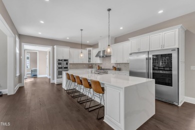 Welcome to this stunning Hasentree Golf Community home, set on on Hasentree Club in North Carolina - for sale on GolfHomes.com, golf home, golf lot