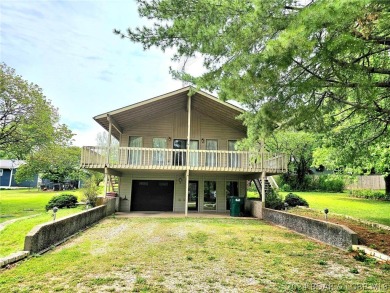 This home features 3 bedroom 2 bathroom, a huge deck that offers on Lake Valley Country Club in Missouri - for sale on GolfHomes.com, golf home, golf lot