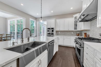 Welcome to this stunning Hasentree Golf Community home, set on on Hasentree Club in North Carolina - for sale on GolfHomes.com, golf home, golf lot