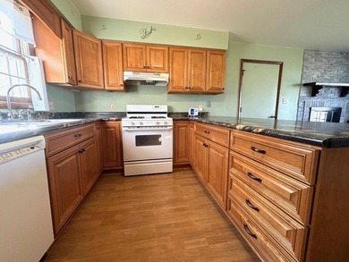 Welcome home to this beautifully maintained 3 Bedroom, 3 on Lakes of the Four Seasons Country Club in Indiana - for sale on GolfHomes.com, golf home, golf lot