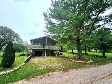 This home features 3 bedroom 2 bathroom, a huge deck that offers on Lake Valley Country Club in Missouri - for sale on GolfHomes.com, golf home, golf lot