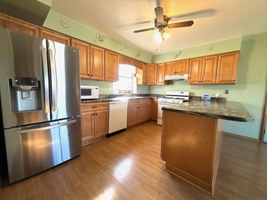 Welcome home to this beautifully maintained 3 Bedroom, 3 on Lakes of the Four Seasons Country Club in Indiana - for sale on GolfHomes.com, golf home, golf lot