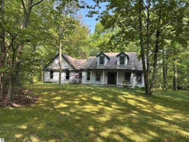 This beautiful custom built home offers 3 bedrooms/3 bathrooms on Singing Bridge Golf Course in Michigan - for sale on GolfHomes.com, golf home, golf lot