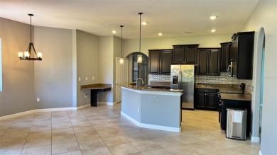 Welcome to your dream home in ChampionsGate - one of Orlando's on The Oasis Club at Champions Gate in Florida - for sale on GolfHomes.com, golf home, golf lot