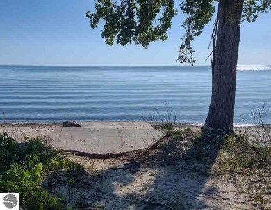 This beautiful custom built home offers 3 bedrooms/3 bathrooms on Singing Bridge Golf Course in Michigan - for sale on GolfHomes.com, golf home, golf lot