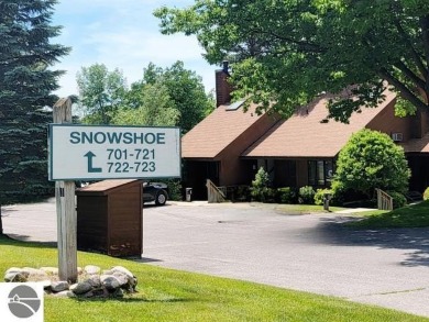 This studio condo offers stunning Lake Bellaire and sunset views on Shanty Creek Golf Course in Michigan - for sale on GolfHomes.com, golf home, golf lot
