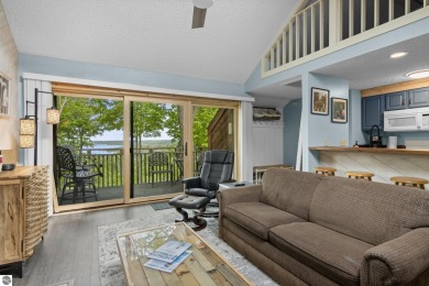 This studio condo offers stunning Lake Bellaire and sunset views on Shanty Creek Golf Course in Michigan - for sale on GolfHomes.com, golf home, golf lot