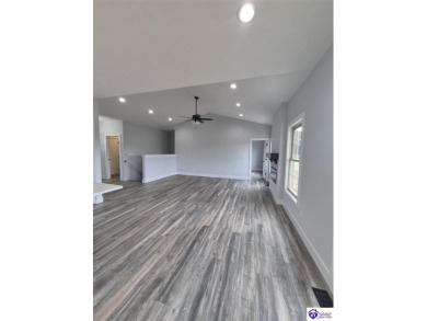 Must see to believe!  Contemporary home with an open floor plan on Lincoln Trail Country Club in Kentucky - for sale on GolfHomes.com, golf home, golf lot