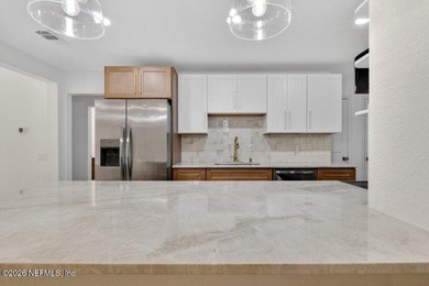 12128 Hidden Hills Drive Welcome to life inside the gated Hidden on Hidden Hills Country Club in Florida - for sale on GolfHomes.com, golf home, golf lot