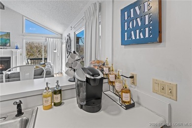 Located in the iconic Tan Tar A Estates, adjacent to on The Oaks Golf Course in Missouri - for sale on GolfHomes.com, golf home, golf lot