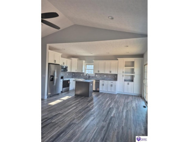 Must see to believe!  Contemporary home with an open floor plan on Lincoln Trail Country Club in Kentucky - for sale on GolfHomes.com, golf home, golf lot