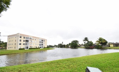 Spacious 2-bedroom 2 bath condo offers a good size kitchen with on Sunrise Lakes Phase IV Golf Course in Florida - for sale on GolfHomes.com, golf home, golf lot