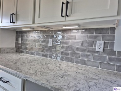 Must see to believe!  Contemporary home with an open floor plan on Lincoln Trail Country Club in Kentucky - for sale on GolfHomes.com, golf home, golf lot