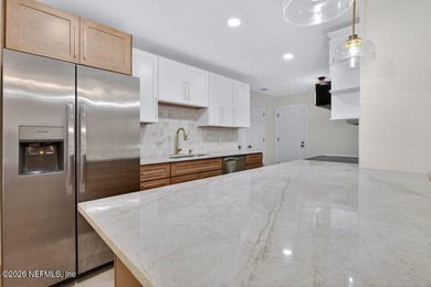 12128 Hidden Hills Drive Welcome to life inside the gated Hidden on Hidden Hills Country Club in Florida - for sale on GolfHomes.com, golf home, golf lot